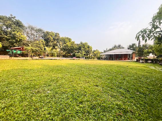 Authentic rustic Red Brick Cottage exterior at Unwind Karjat