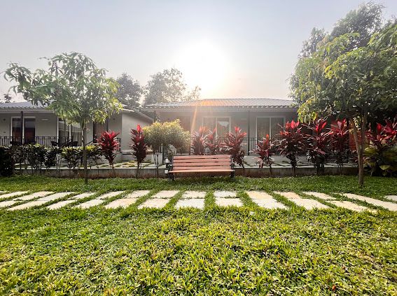 Outdoor forest wedding setup at Unwind Karjat